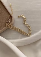 سوار بتصميم سلاسل متعددة مطلي ذهب . MB-358