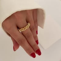 خاتم مجدول مؤلف من صفوف كرات مطلي ذهب MR-024