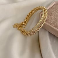 مجموعة من ثلاث اساور مطلية ذهب. MB-217