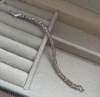 أسوارة تيفاني موديل xo فضي مع ذهبي. MB-107