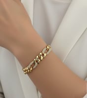 إسوارة جنزير مطليه ذهب ومزينه بالزركون الذهبي البر...