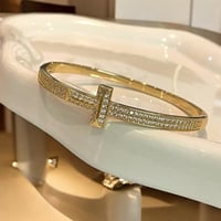 سوار مستوحى من أسلوب T الايقوني مغطى بالزركون مطلي...