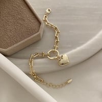 سوار جنزير مع تعليقة بشكل قلب مطلي ذهب عيار ١٤. MB...