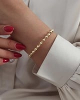 سوار مرن مؤلف من كرات ذهبية مطلي ذهب عيار ١٤. MB-1...