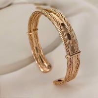 أسوارة مرنة مفتوحة مطلية ذهب . MB-132