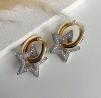 أقراط أذن بشكل نجمة مرصعة بالألماس اون ذهبي ME-026