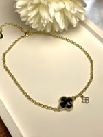 خلخال مع وردة فان كليف لون أسود. MA-003