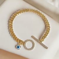 سوار جنزير مع قفل دائري وخرزة زرقاء مطلي ذهب. MB-1...