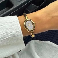 ساعة نسائية ستيل بلون ذهبي ميناء رمادي