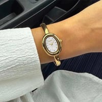 ساعة نسائية ستيل بلون ذهبي ميناء ابيض