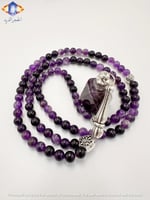 عقد وسبحه من حجر الأماثيست (الجمشت) مع توله من حجر...