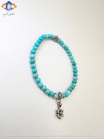 سوار حجر الفيروز الطبيعي الكريم مع تعليقه فضيه.