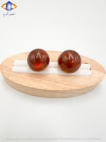 حلق من العنبر الطبيعي الكريم .