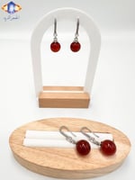 حلق من الفضه وحجر الروبي الطبيعي الكريم .