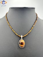 عقد وتعليقه حجر عين النمر الكريم الطبيعي .