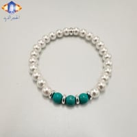 سوار اللؤلؤ الصدفي الطبيعي يتوسطها حبات حجر الفيرو...