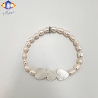 سوار لؤلؤ المياه العذبه الطبيعي المميز يتوسطها قلو...