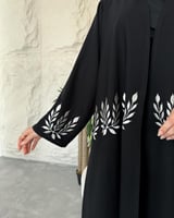 عبايا عمليه دوامات