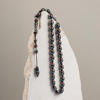 سبحه سوداء جميلة بنقاط حمراء وزرقاء