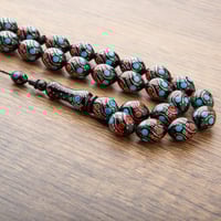 سبحه رائعة بخرز ملون أخضر وأحمر