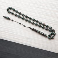 سبحه سوداء مميزة بنقشاتها الفضية الناعمة