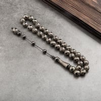 سبحة سوداء رائعة مطرزة بنقوش فضية