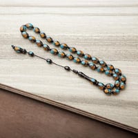 سبحه خرز رائعة بألوان اسود وأصفر وسماوي