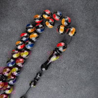 سبحه مذهلة باللون الاسود ونقشات ملونة