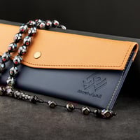 سبحه سوداء جميلة بنقاط حمراء وزرقاء