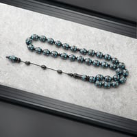 سبحة سوداء مذهلة منقوشة بخرز تركواز