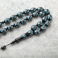 سبحة سوداء مذهلة منقوشة بخرز تركواز