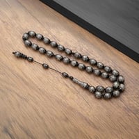 سبحة كوك فضه 12 ملي أسود مذهّب