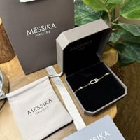 سوارة ميسيكا ذهبي