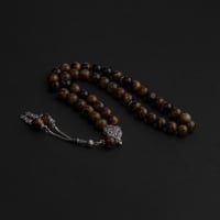 سبحة بحجر عين النمر مع شكة فضة 10 مل