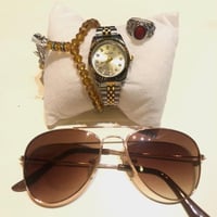 4 قطع من مجموعة الطفل المدلل ,سبحة ,خاتم ,ساعة يد...