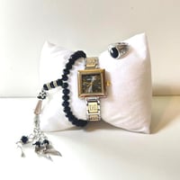 3 قطع من مجموعة الطفل المدلل ,سبحة ,خاتم ,ساعة يد...