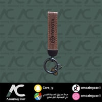 ميدالية تويوتا جلد لون خشبي