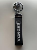 ميدالية هوندا جلد