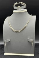 طقم ذهب أبيض للعروس عيار 18 وميض التتويج وزن 14.4...