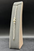 اسوارة لؤلؤ نحيف شكل شمس عيار 18 وزن 0.8 جرام