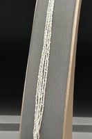 اسوارة لولو طبيعي عيار 18 تصميم شرائط صغيرة وزن 3....