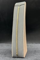 اسوارة مجدول ذهب صافي عيار 18 من 2.7 الى 2.8 جرام