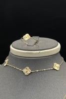 طقم ثلاث وردات ذهب صافي عيار 18 وزن من 3.4 الى 3.5...