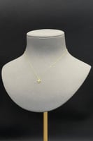 عقد زهرة ذهب تصميم الماس عيار 21 وزن 0.5 جرام