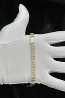 اسوارة ذهب مع باقيت تصميم الماس عيار 18 وزن 10.3 ج...