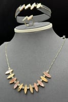 طقم اوراق ذهب تصميم الماس عيار 18 وزن 16.6 جرام