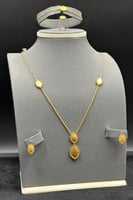 طقم ذهب صافي عيار 21 وزن 9.1 جرام