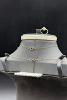 طقم ذهب فان كليف عيار 18 زهرة الحظ وزن من 2.2 إلى...