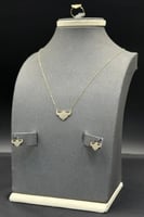 طقم أطفال ذهب تصميم الماس عيار 18 وزن من 1.9 الى 2...