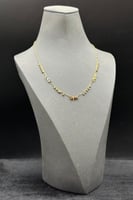 عقد اوراق مع كور ذهب صافي عيار 18 وزن 4.6 جرام